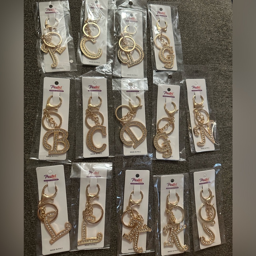 B and g left pick 1 gold initial rhinestone keychain